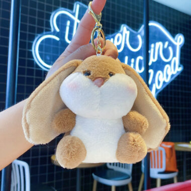 Premium Bunny Plush Toy with Big Ears for Bags & KeychainsThis adorable bunny plush toy features big ears and super-soft fur, designed as a keychain or bag pendant. Perfect for TikTok fans, claw machine collectors, and cute accessory lovers.